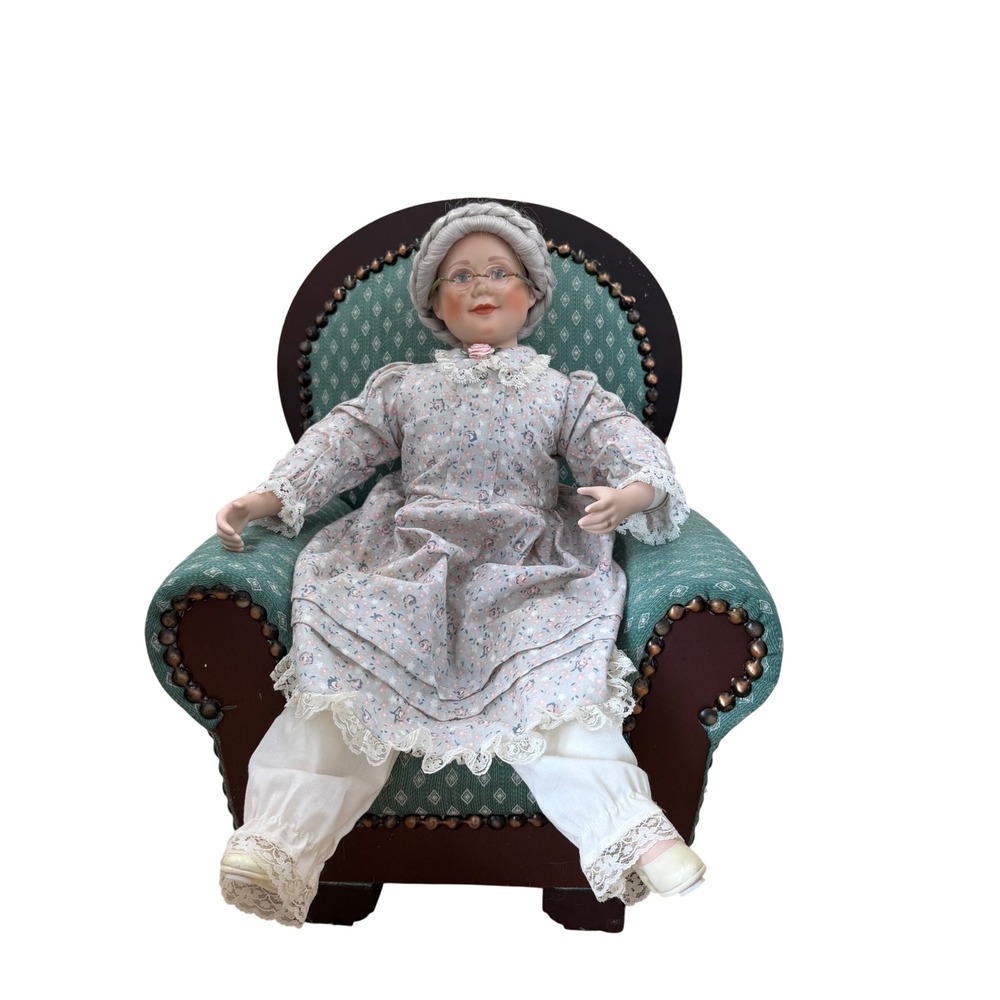 Vintage Porcelain Grandmother Doll in Green Upholstered Armchair Collectible